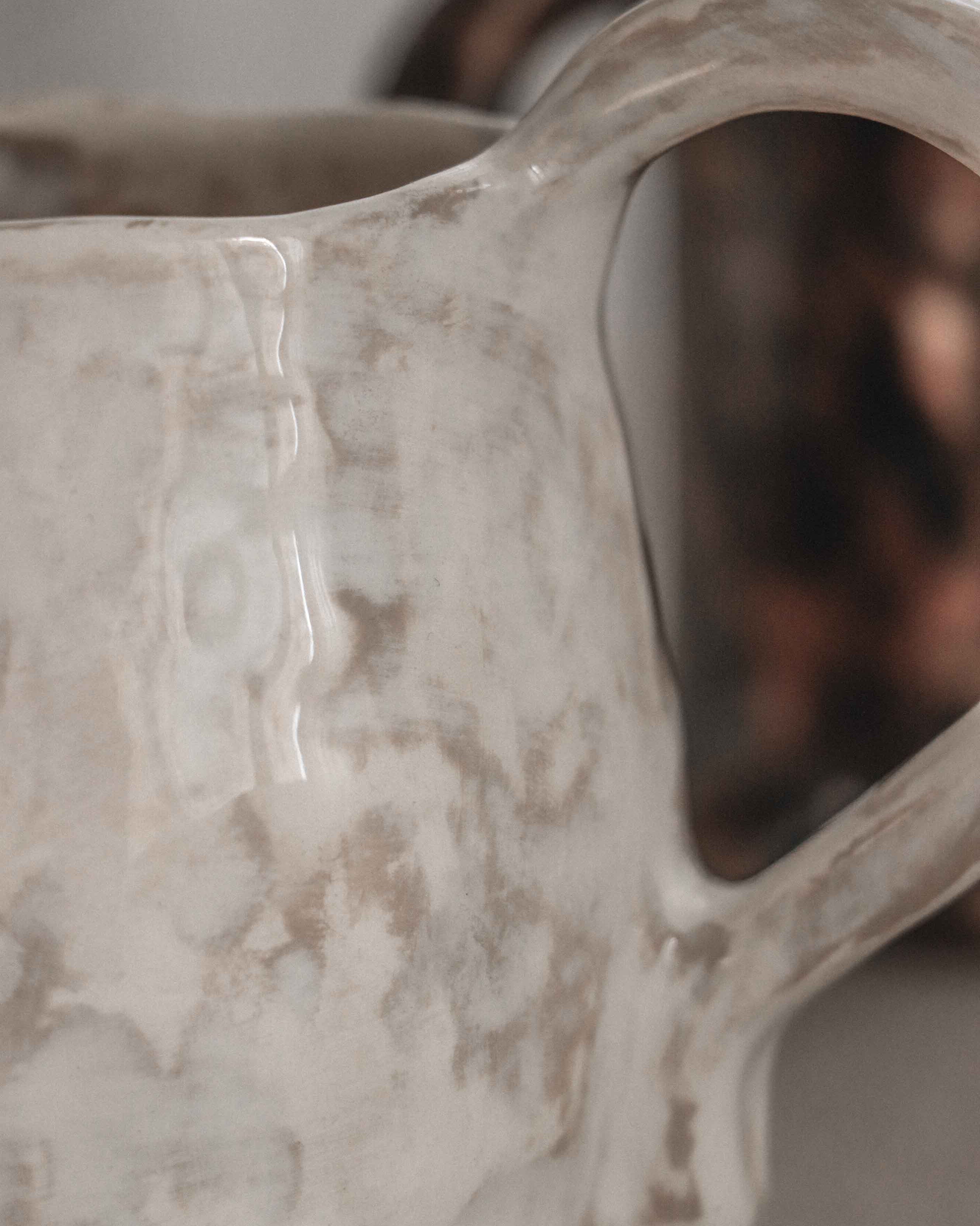 Close-up of a ceramic mug with a textured surface